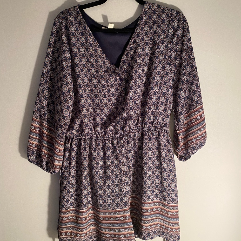 Very cute and flattering romper with boho pattern size large